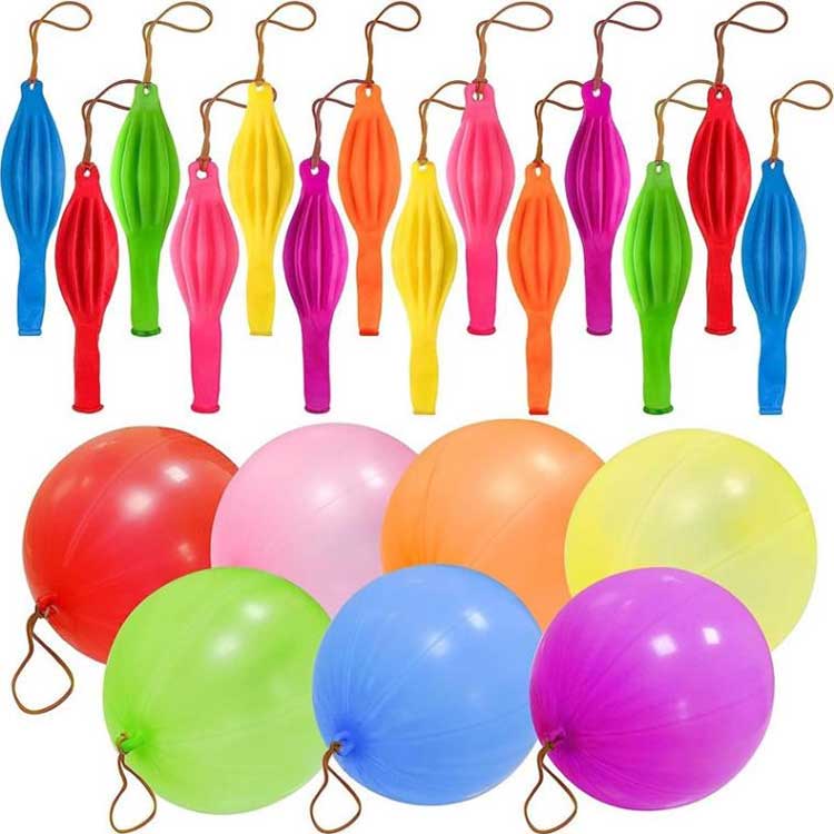 Perforar globos con una banda elástica