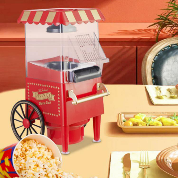 Máquina retro para hacer palomitas de maíz con carrito de mano
